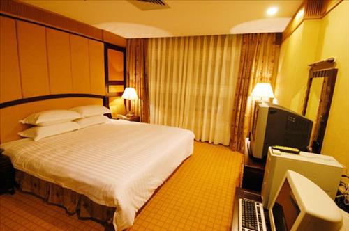 Rongwei Business Hotel Canton Chambre photo